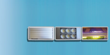 Three modern rectangular lighting fixtures displayed against a blue gradient background.